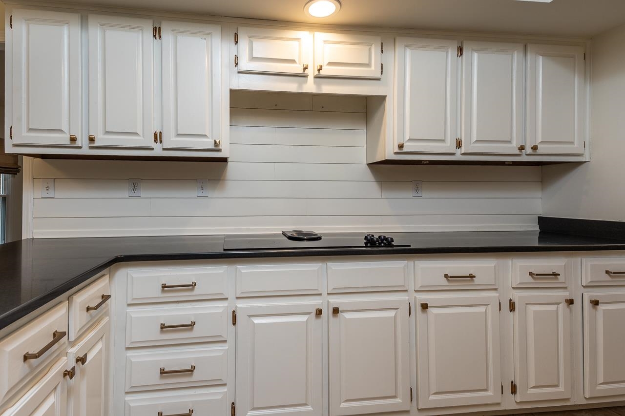 759 West Powell Road Collierville, TN 38017 - Photo 10 of 39 a view of white cabinets and a wooden floor