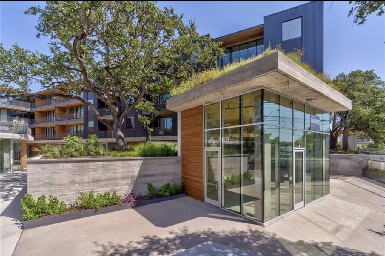 900 South 1st Street, Unit 304 Austin, TX 78704 - Photo 21 of 22 a front view of a house with a garden