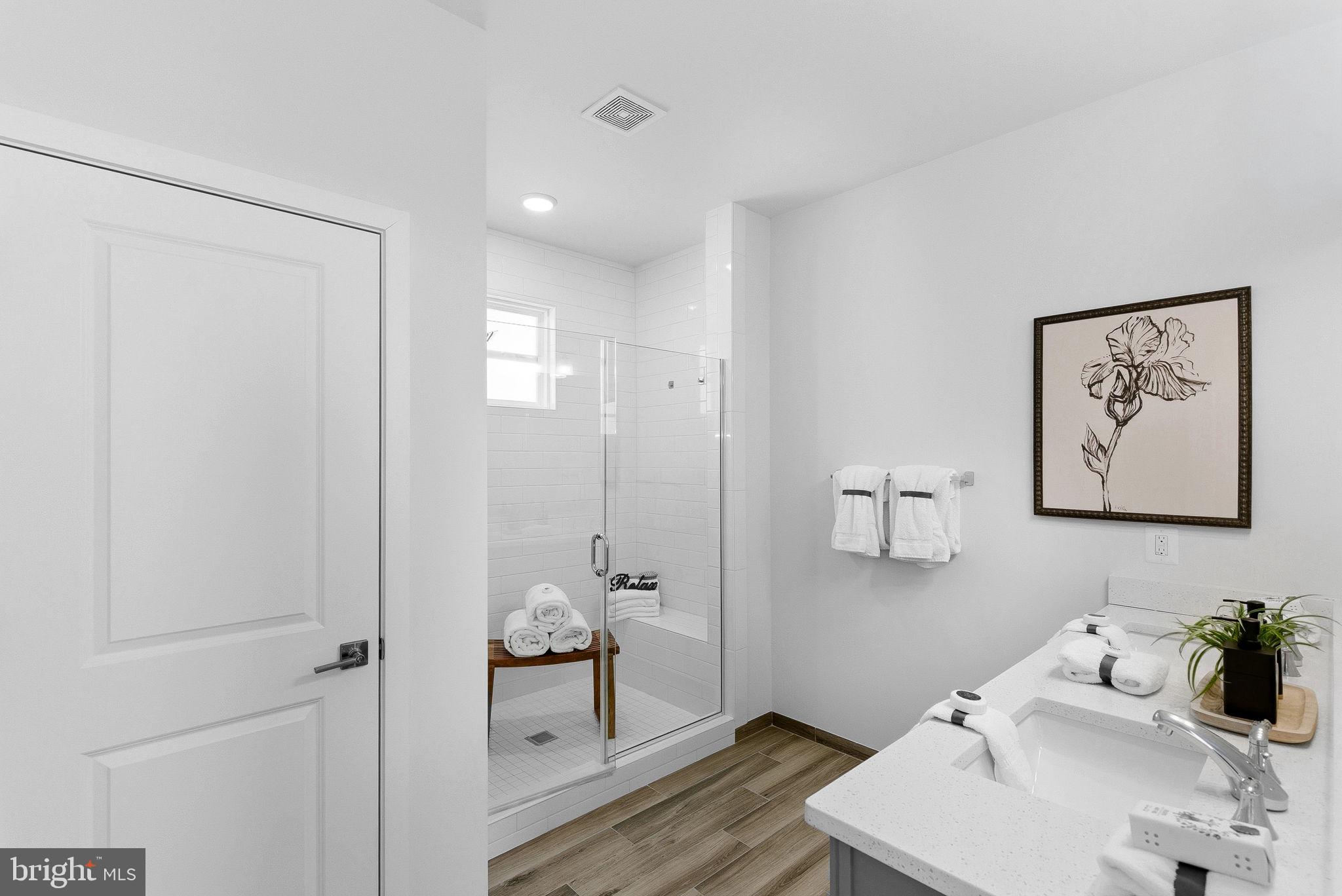 21340 Rainier Lane Broadlands, VA 20148 - Photo 27 of 62 a bathroom with a sink and a mirror