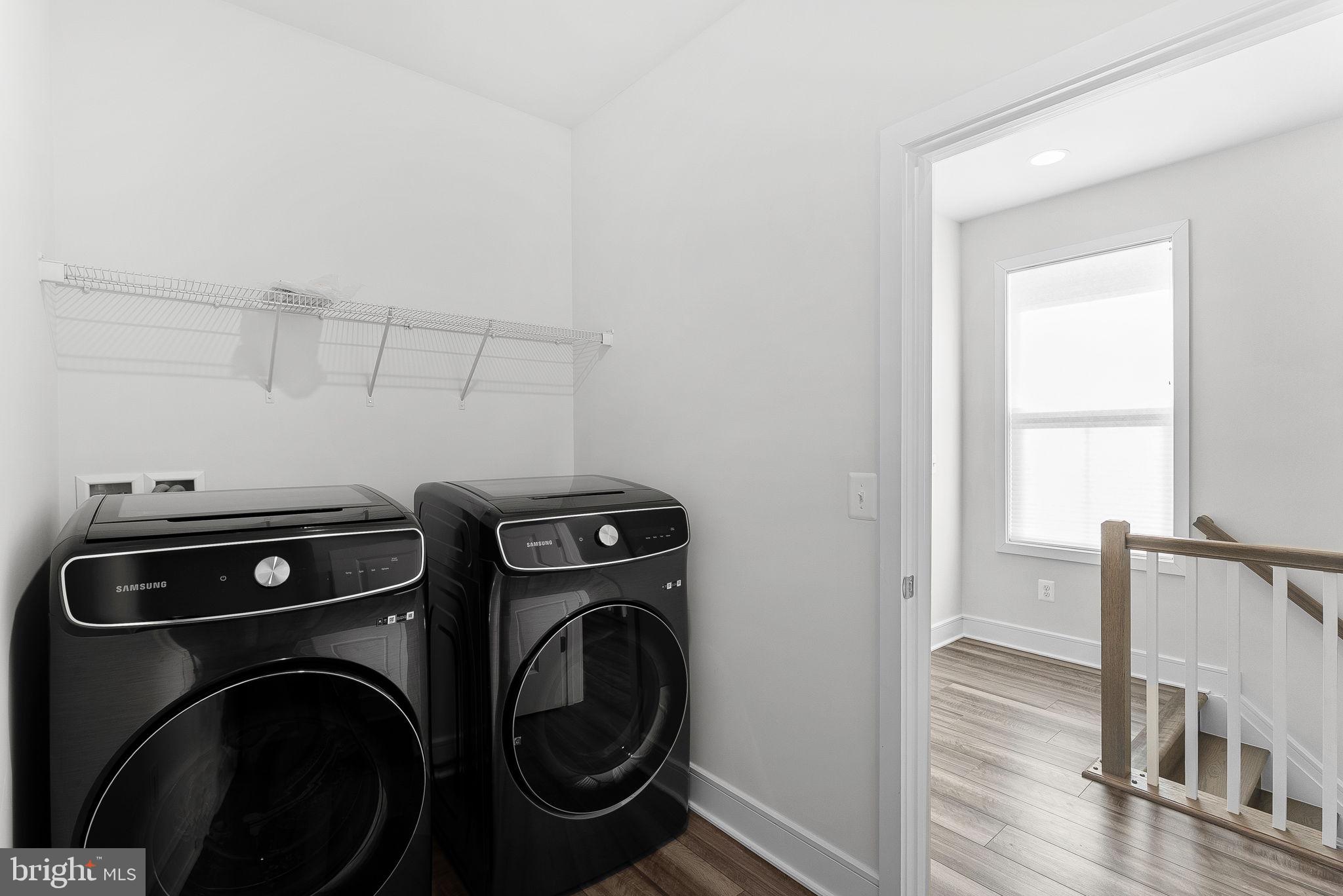 21340 Rainier Lane Broadlands, VA 20148 - Photo 38 of 62 a view of storage and utility room with washer and dryer