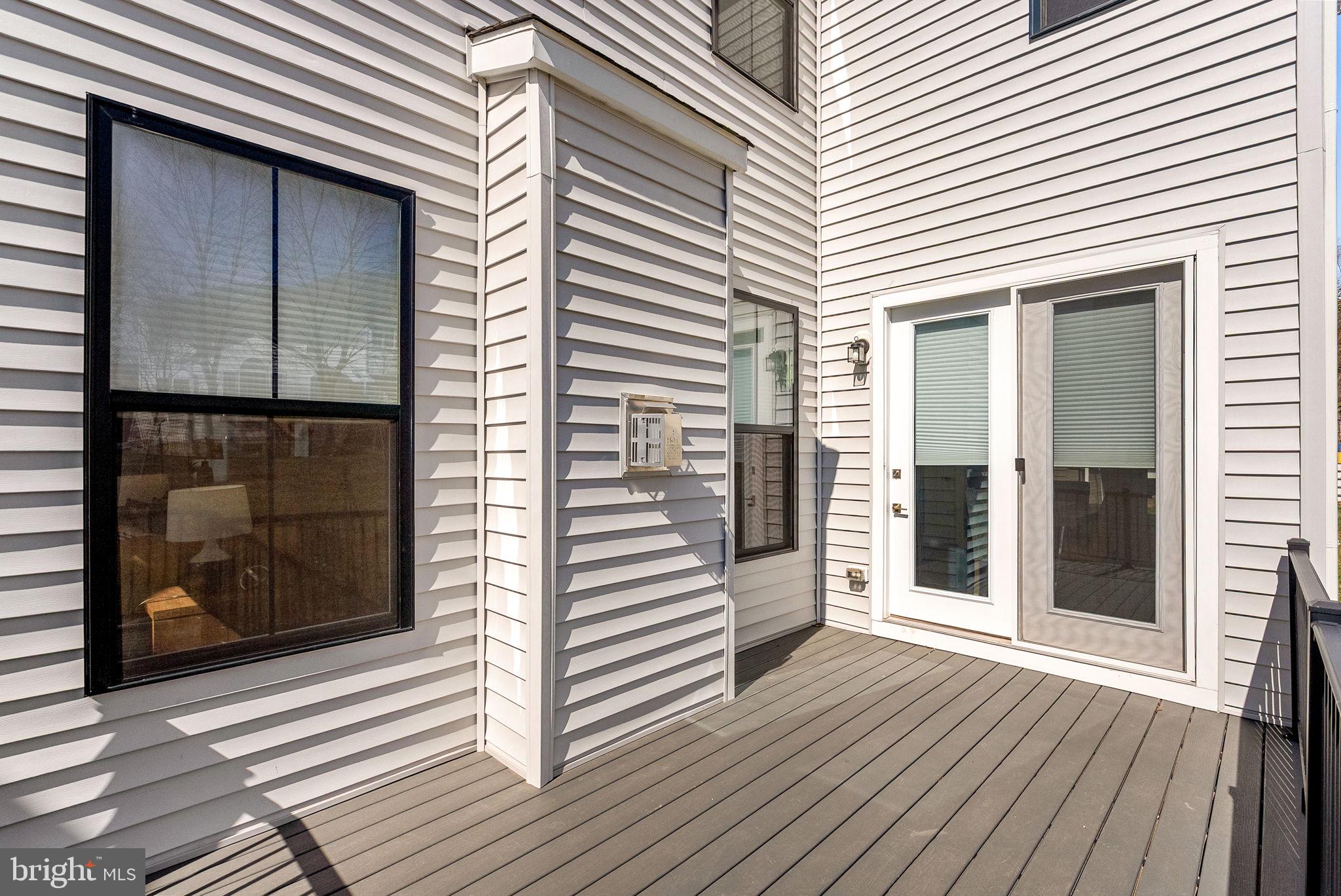 21340 Rainier Lane Broadlands, VA 20148 - Photo 45 of 62 a view of a house with a door and wooden floor