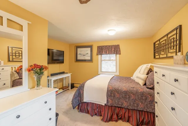 a bathroom with a sink a mirror and a shower