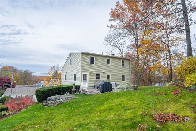 a front view of house with garden