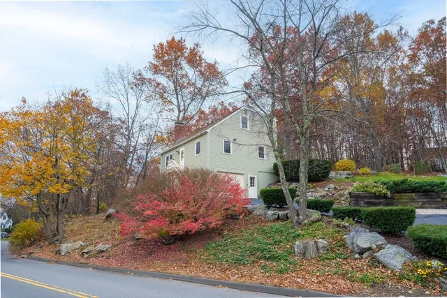 a backyard of a house with lots of green space