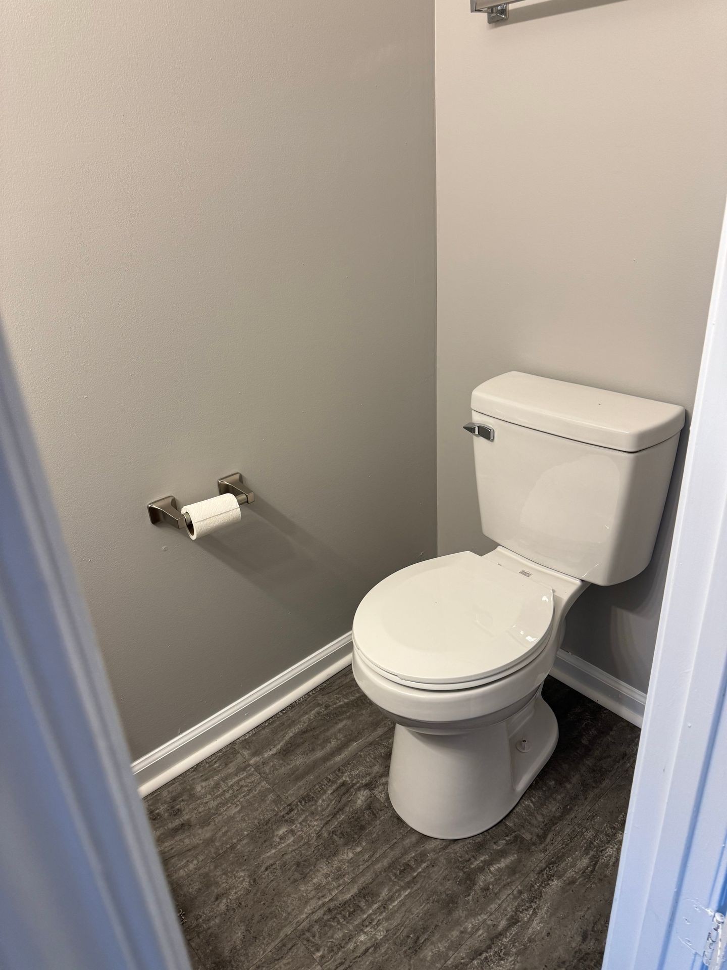 2453 Wilson Road, Unit 4 Clarksville, TN 37043 - Photo 9 of 20 a white toilet sitting in a bathroom