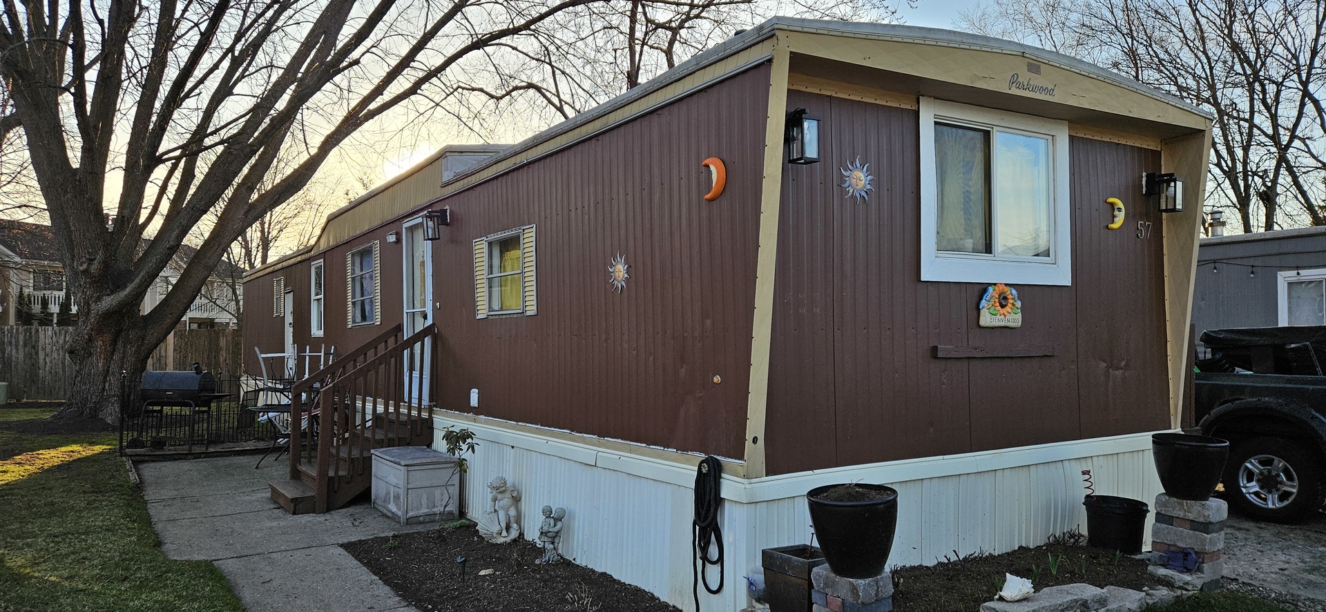 a front view of a house with many windows