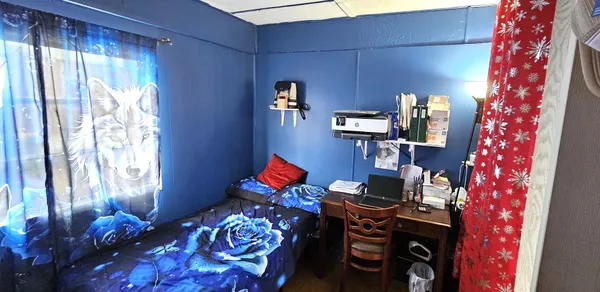 a room with furniture and a window