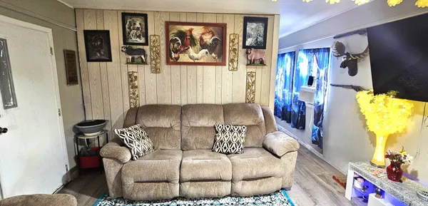 a living room with furniture and a couch