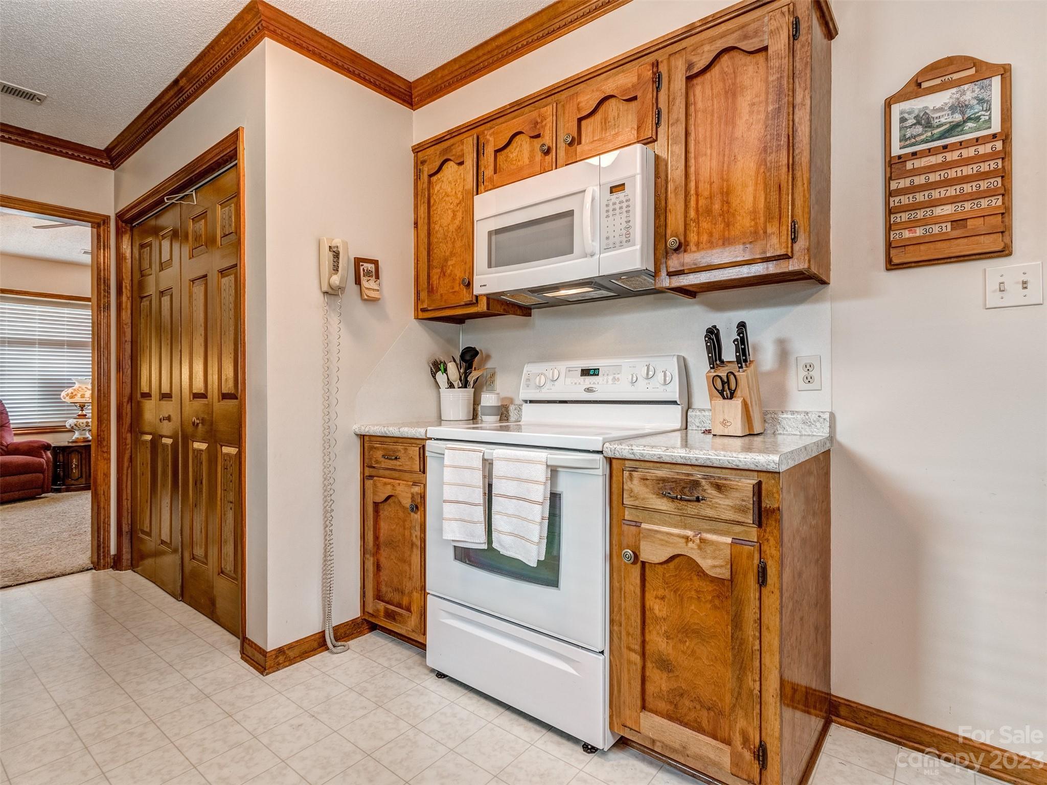 1967 Ebenezer Road Rock Hill, SC 29732 - Photo 12 of 26 a kitchen with stainless steel appliances granite countertop a stove and a microwave