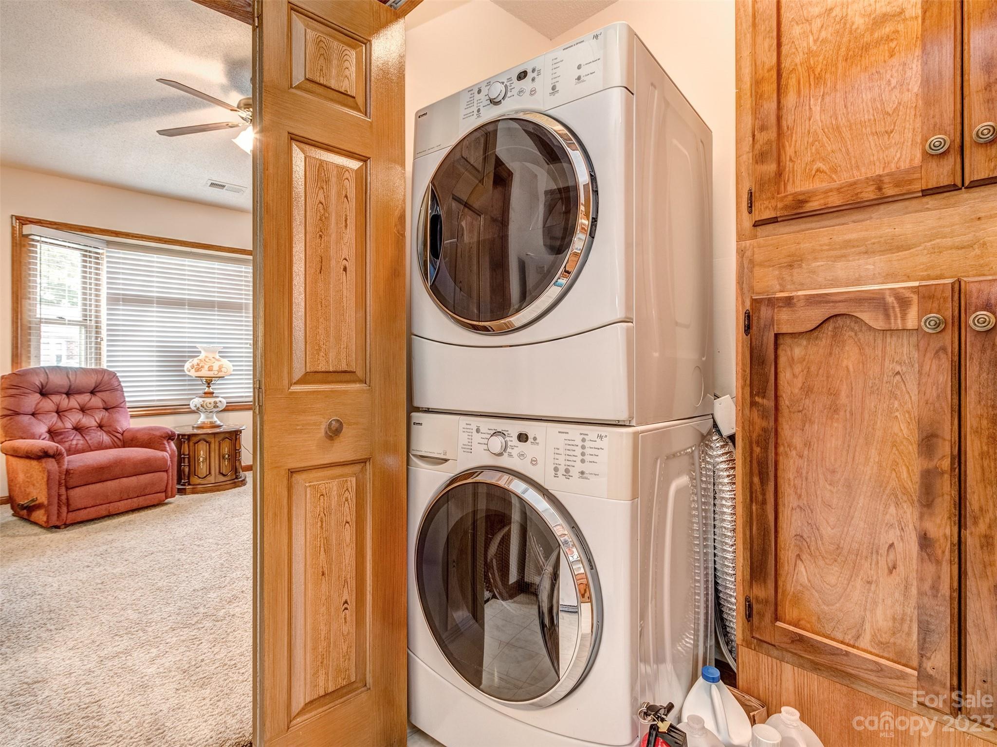 1967 Ebenezer Road Rock Hill, SC 29732 - Photo 14 of 26 a view of a hallway with washer and dryer