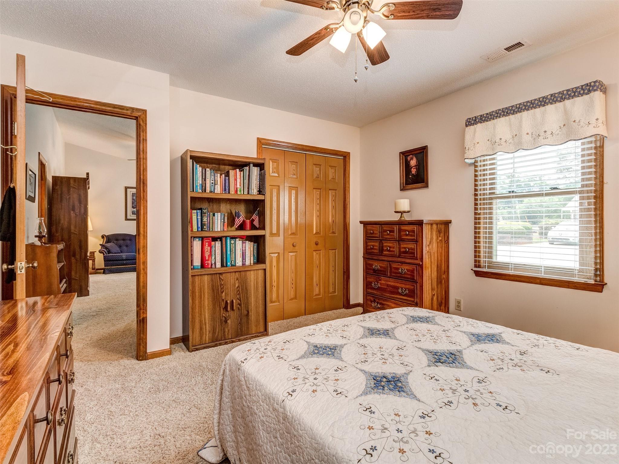 1967 Ebenezer Road Rock Hill, SC 29732 - Photo 22 of 26 a bedroom with a large bed and a window