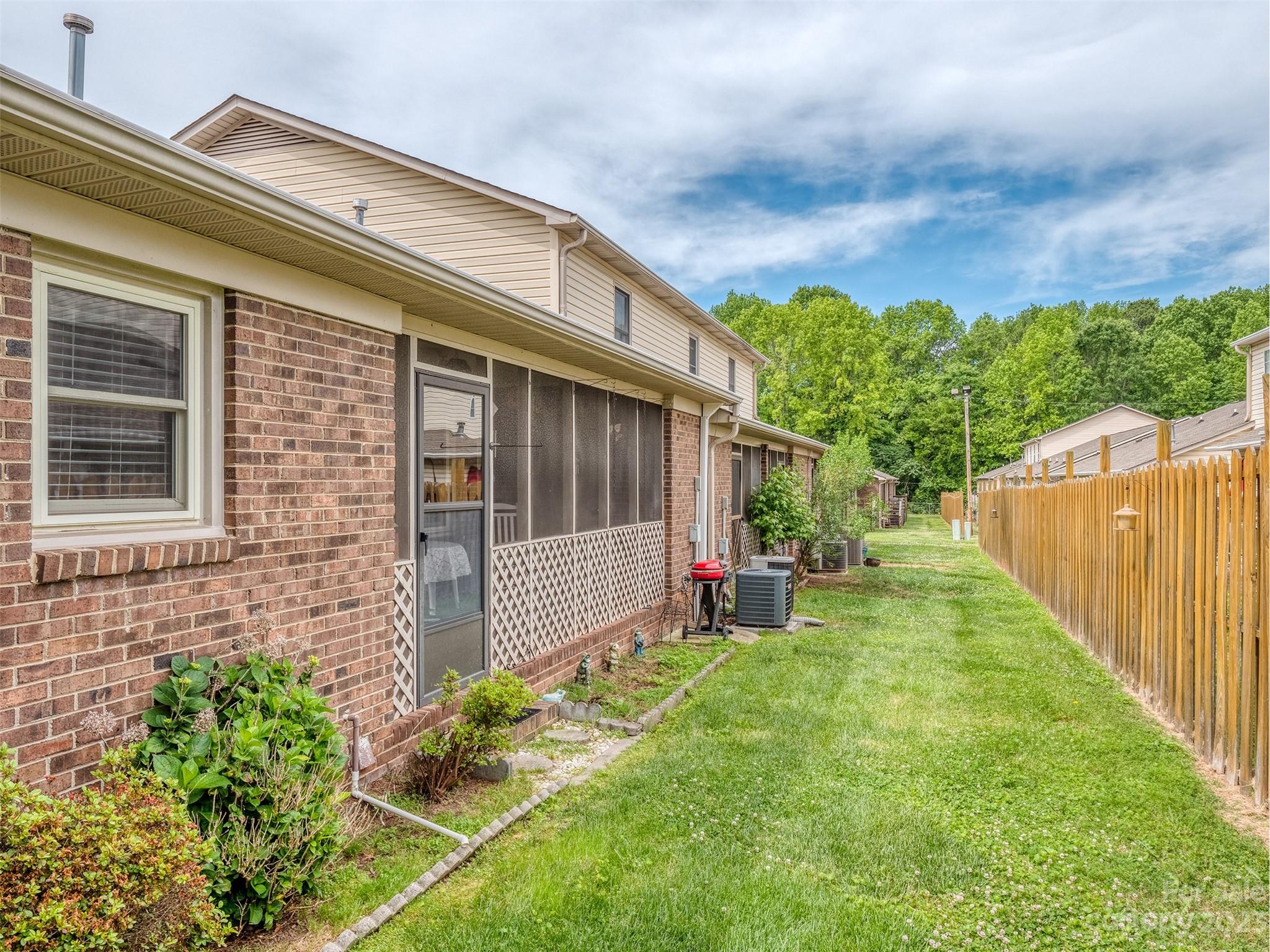 1967 Ebenezer Road Rock Hill, SC 29732 - Photo 25 of 26 a view of a house with backyard and sitting area