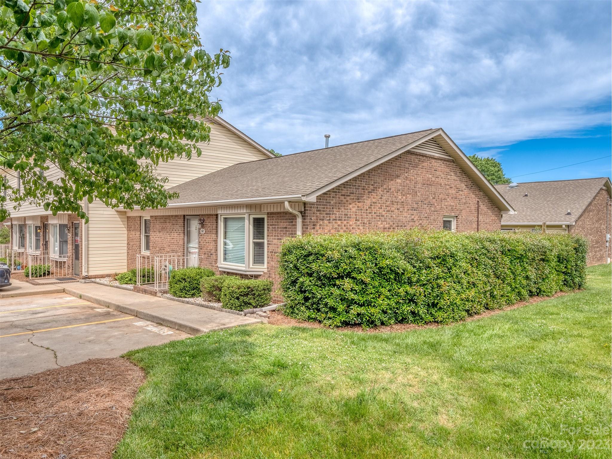 1967 Ebenezer Road Rock Hill, SC 29732 - Photo 3 of 26 a front view of a house with a garden and yard