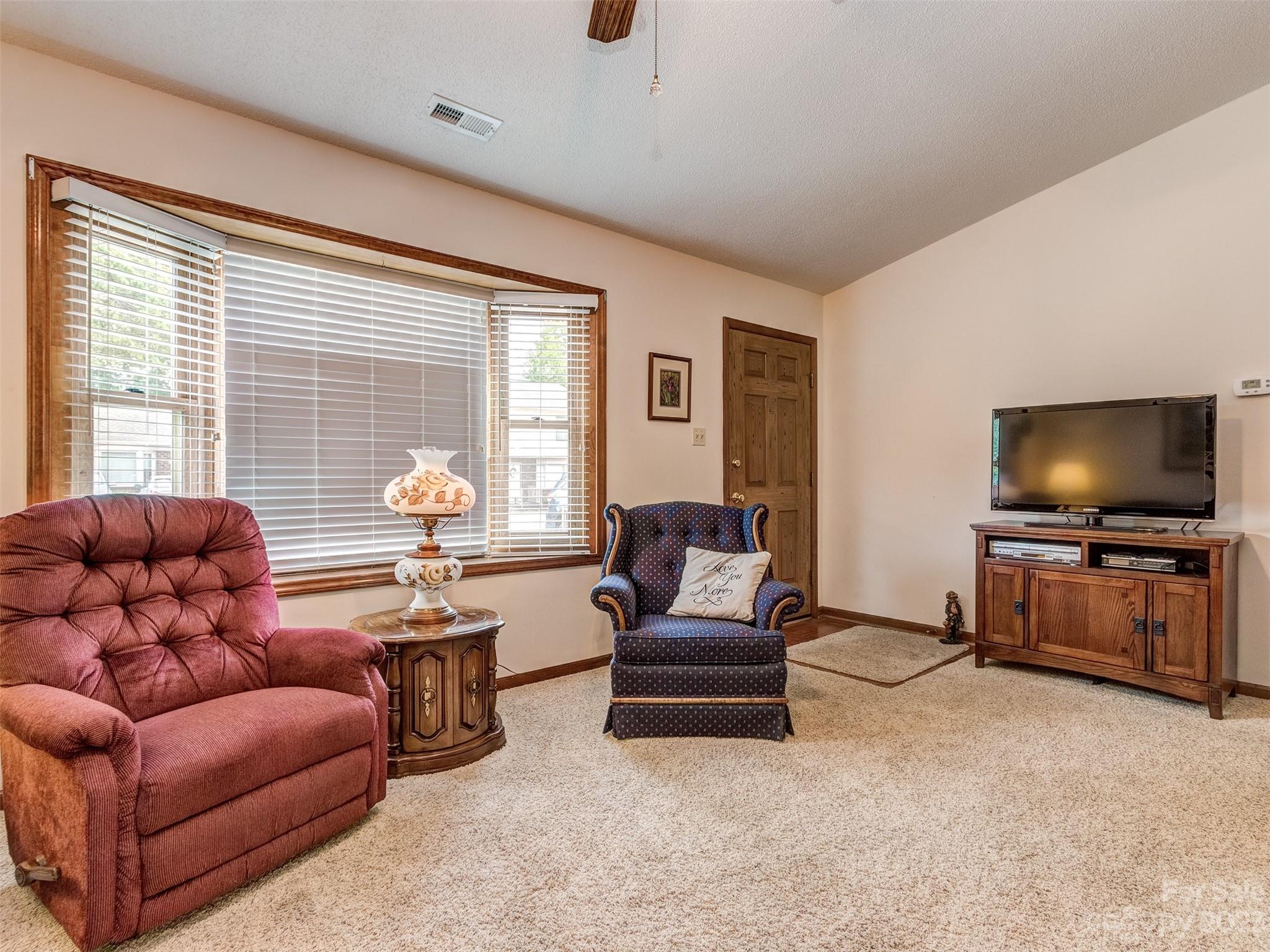 1967 Ebenezer Road Rock Hill, SC 29732 - Photo 6 of 26 a living room with furniture and a flat screen tv