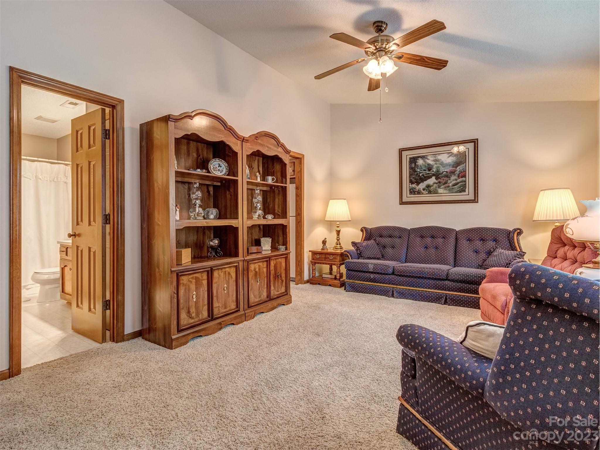1967 Ebenezer Road Rock Hill, SC 29732 - Photo 8 of 26 a living room with furniture a ceiling fan and a window