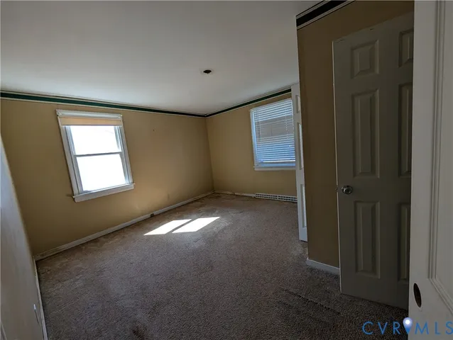 an empty room with windows