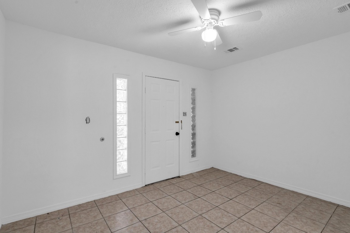 3922 Simsbrook Drive Houston, TX 77045 - Photo 15 of 32 It's door lead to the Covered Car Port.