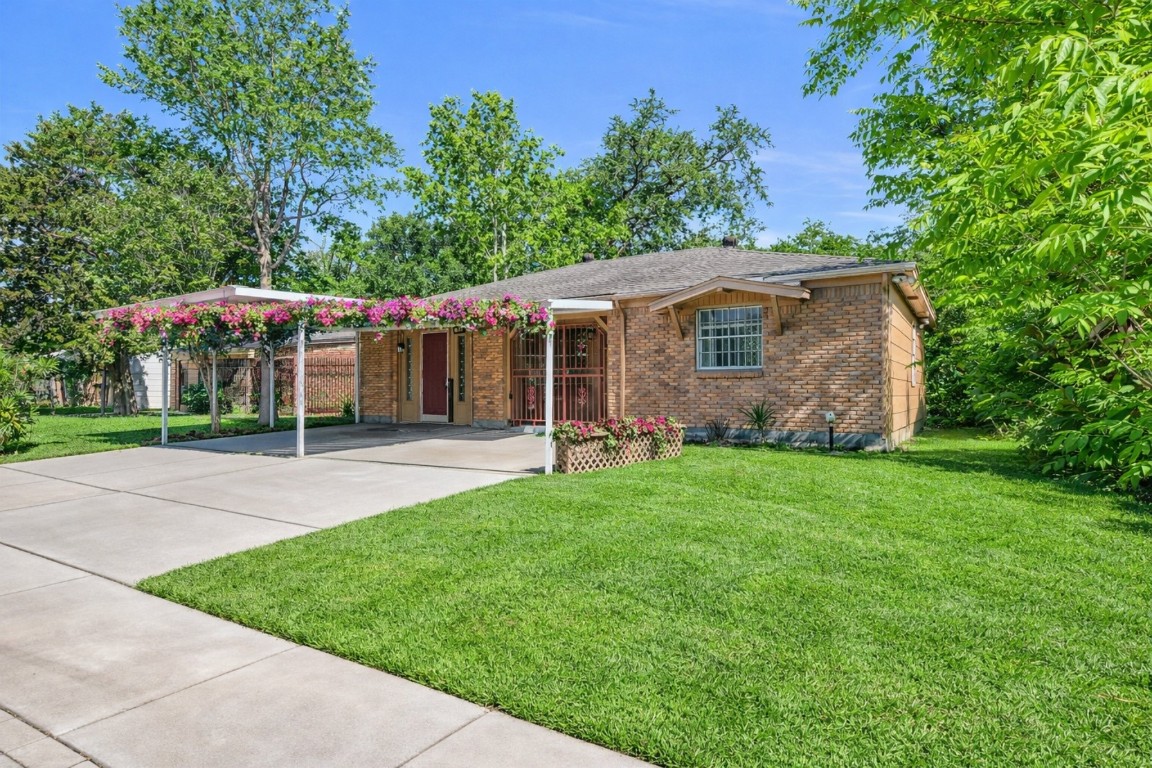 3922 Simsbrook Drive Houston, TX 77045 - Photo 2 of 32 2 vehicle Carport to protect your cars from the weather!