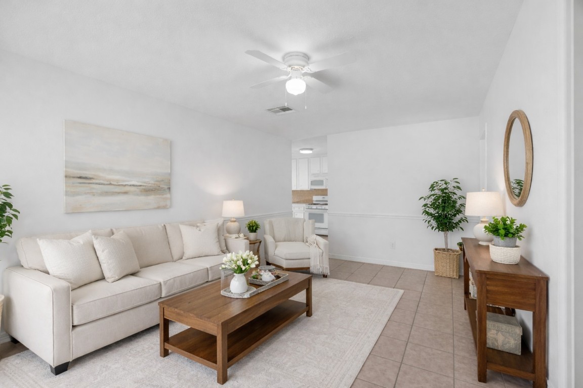 3922 Simsbrook Drive Houston, TX 77045 - Photo 4 of 32 Nice living room, digitally staged.