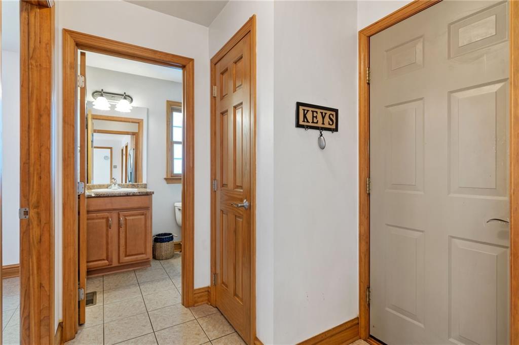 543 Birch Drive Houston, PA 15342 - Photo 18 of 48 a view of a hallway with bathroom and front door