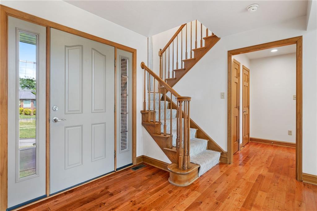 543 Birch Drive Houston, PA 15342 - Photo 6 of 48 a view of an entryway with wooden floor door and windows