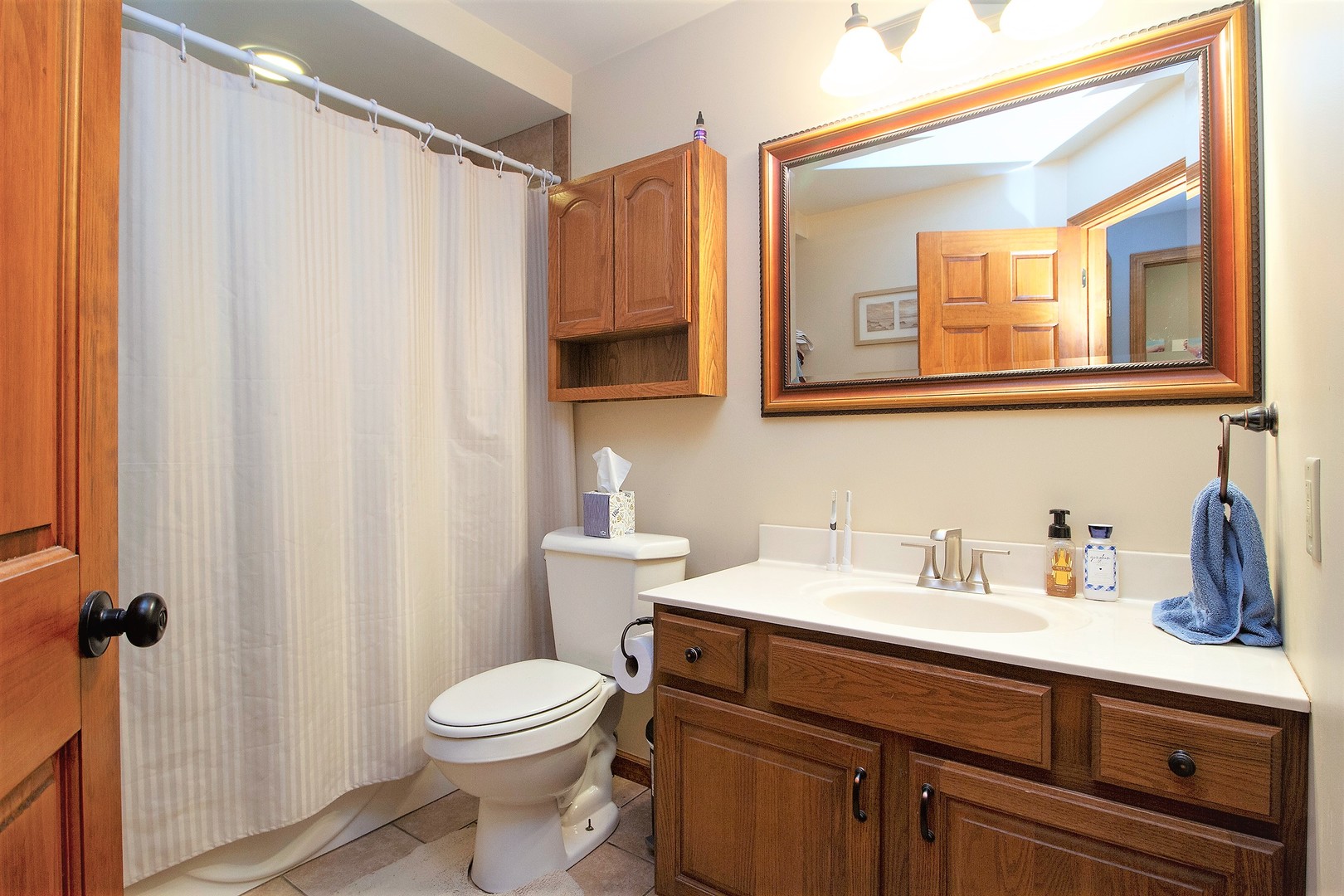 3100 Sportsman Club Road Bourbonnais, IL 60914 - Photo 11 of 15 a bathroom with a sink a toilet and a mirror