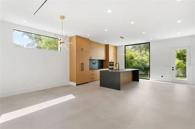 a view of a hallway to an entryway