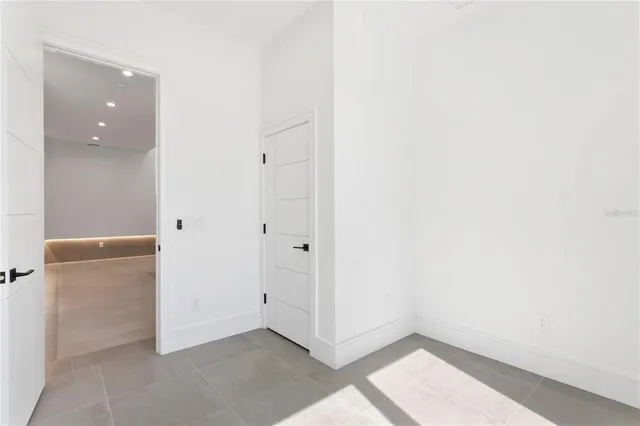 a bathroom with a bathtub and a window