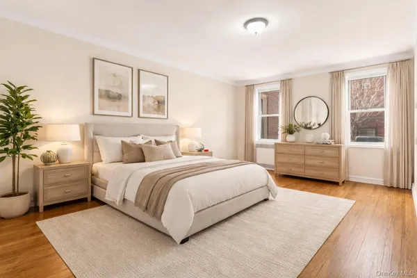 a spacious bedroom with a bed and a couch