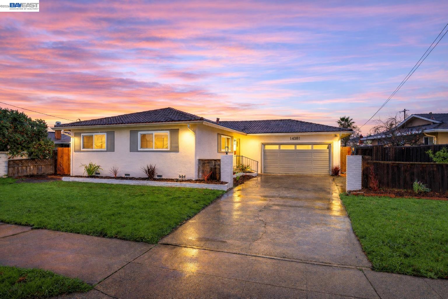 a front view of house with yard