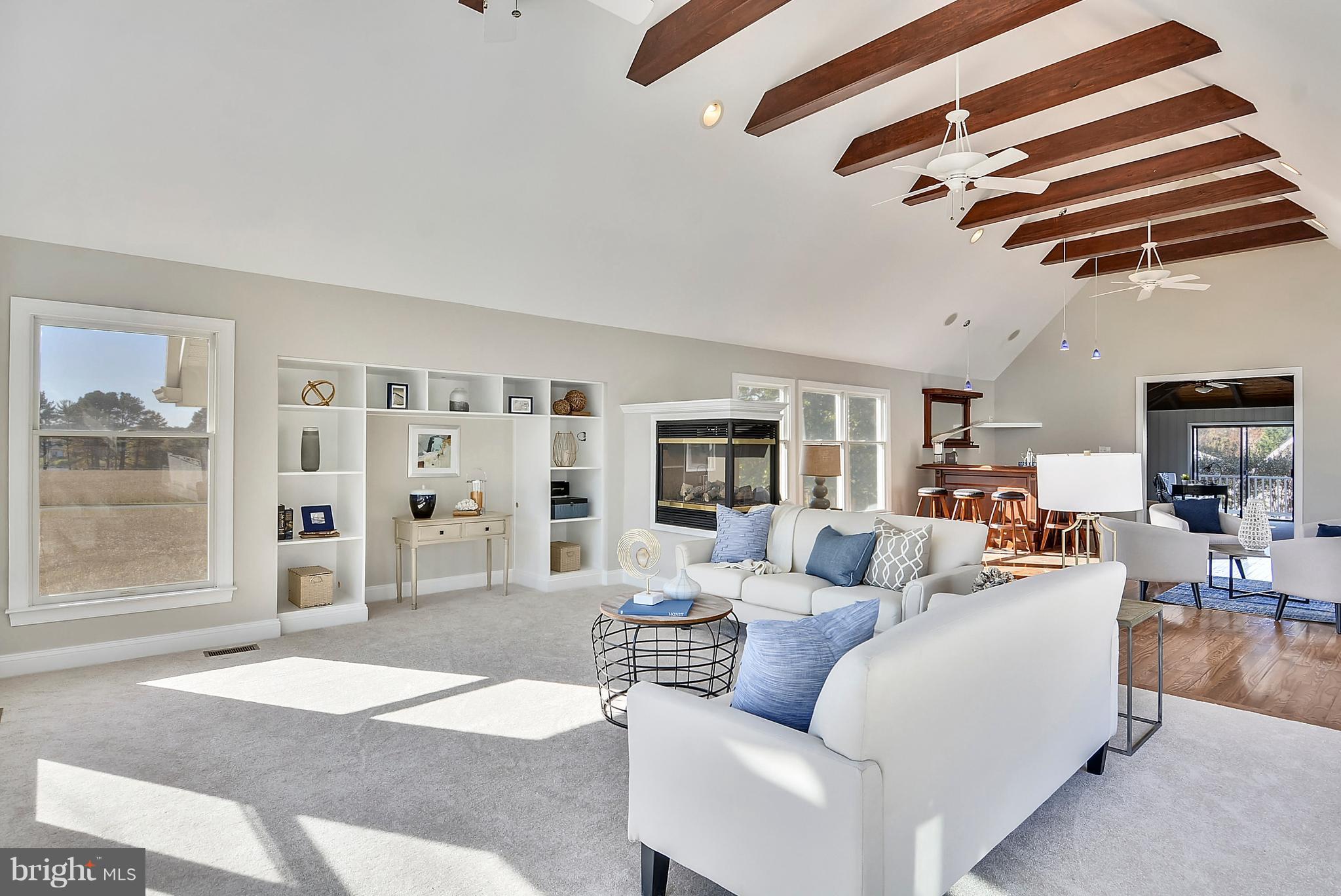 104 Thompson Road Chester, MD 21619 - Photo 17 of 29 Family Room with the beam ceiling