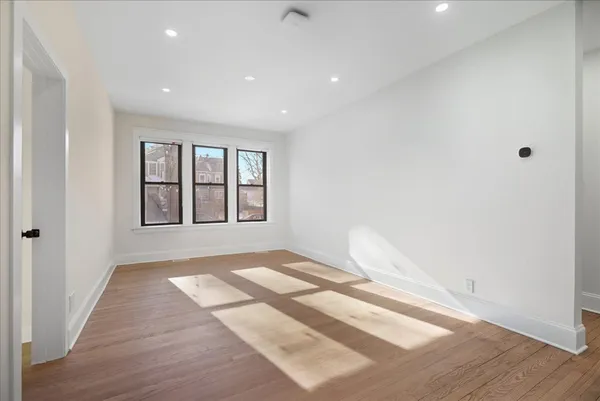 a view of an empty room and window