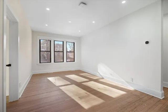 a view of an empty room and window