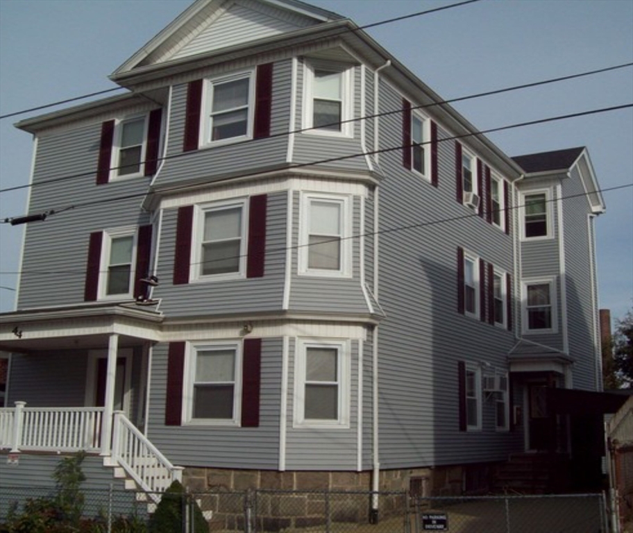 44 Crawford Street, Unit 3 Fall River, MA 02724 - Photo 8 of 8 a large building with a lot of windows