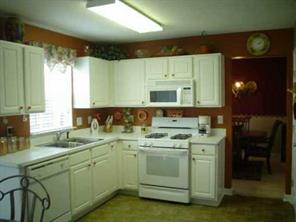 2081 Chapel Creek Road Concord, NC 28025 - Photo 6 of 8 a view of a kitchen with a sink and cabinets