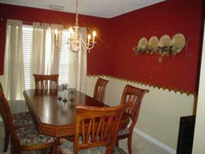 2081 Chapel Creek Road Concord, NC 28025 - Photo 7 of 8 a view of a dining room with furniture window and outside view