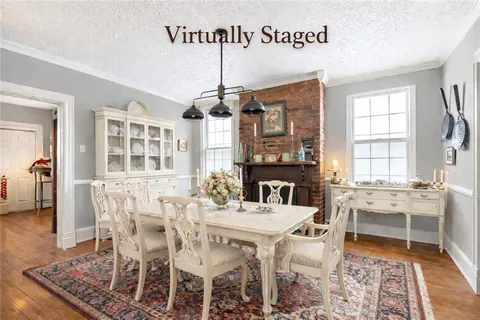 a view of a dining room with furniture