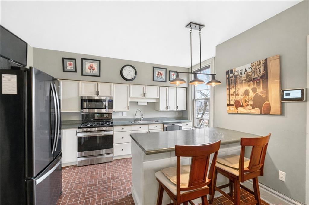 30 Perry Street Pittsburgh, PA 15209 - Photo 22 of 43 This kitchen has lots of counter space for cooking and baking.