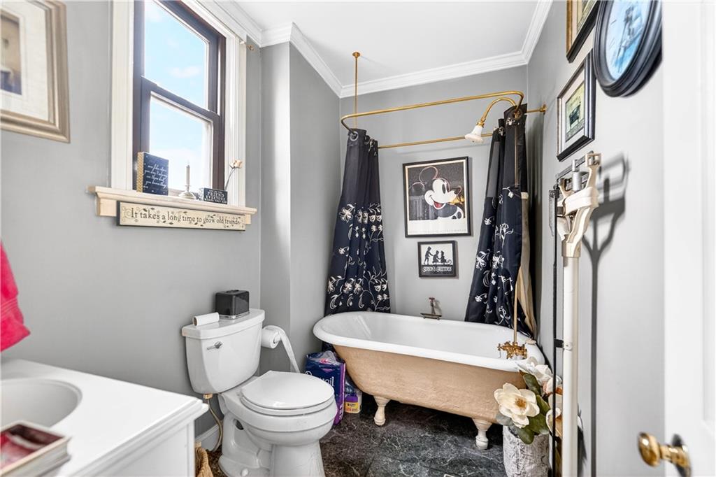 30 Perry Street Pittsburgh, PA 15209 - Photo 25 of 43 This full bath is located on the first floor of the home. The Claw tub is great for soaking and relaxing.