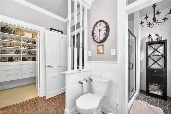 a bathroom with a toilet and a sink