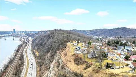 a view of city and mountain