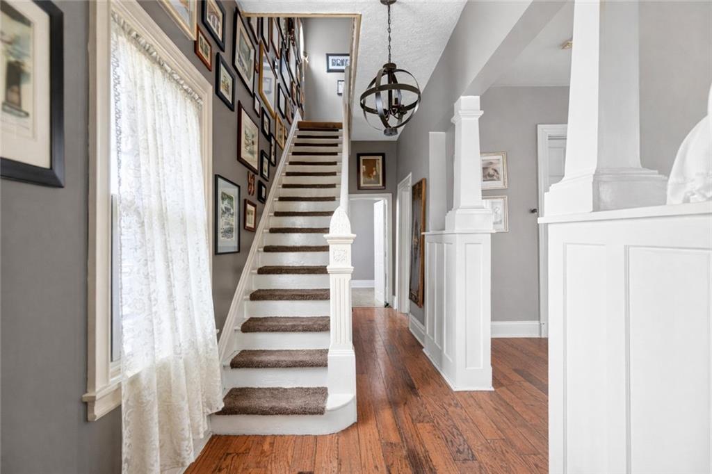 30 Perry Street Pittsburgh, PA 15209 - Photo 6 of 43 Entry hall with grand staircase, high ceilings and craftman style built-ins