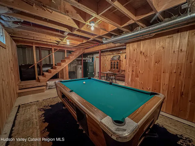 a room with chairs and stairs