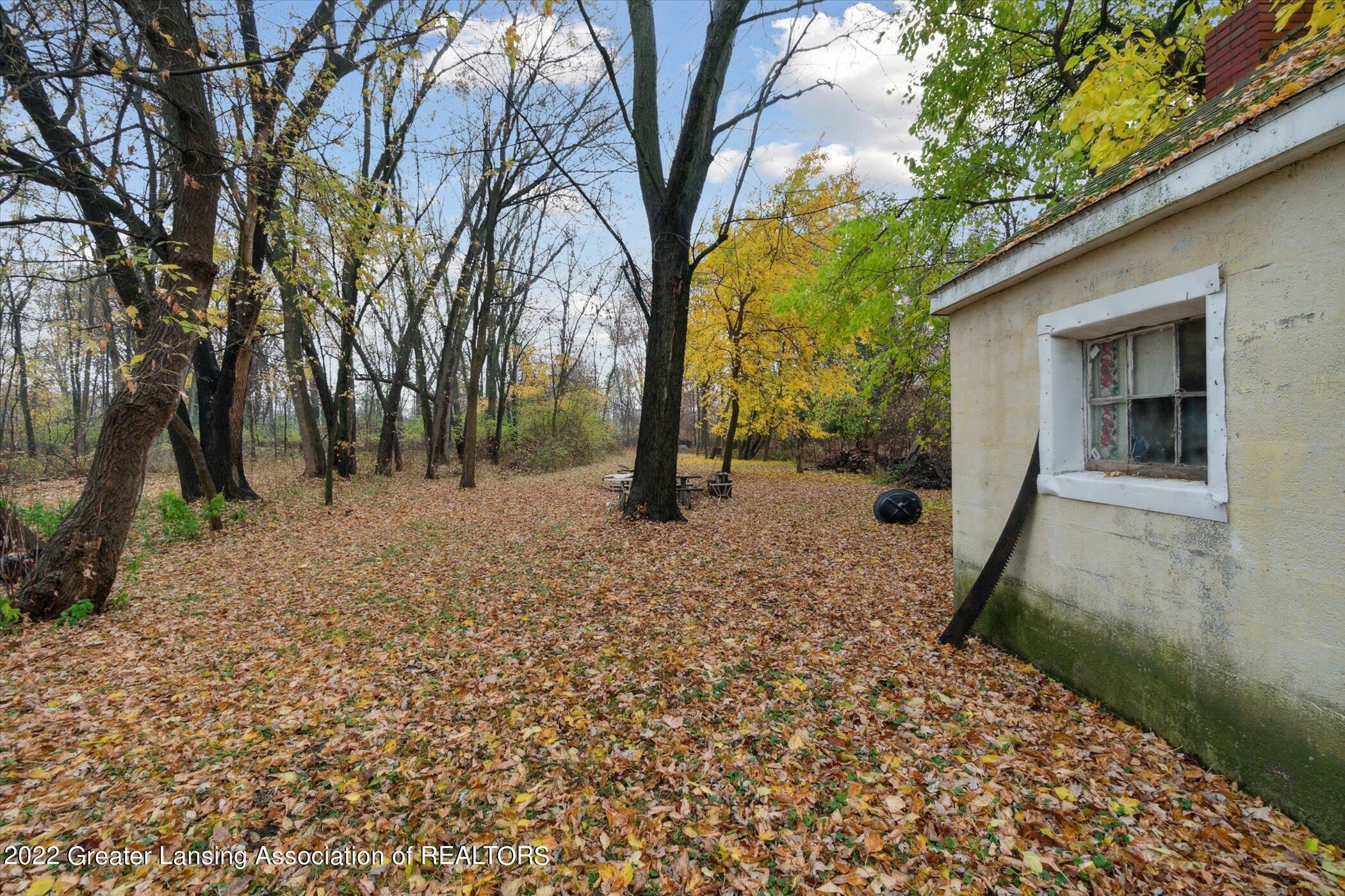 5439 Hughes Road Lansing, MI 48911 - Photo 10 of 10 12-5439-Hughes-Rd-WindowStill-Real-Estat