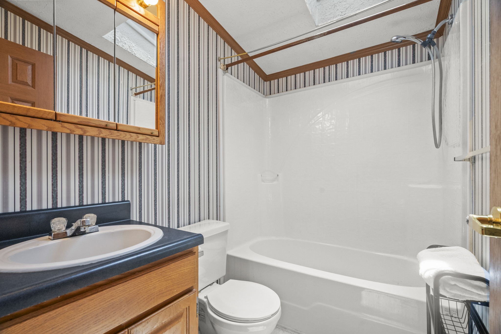 4012 Armstrong Road Springfield, TN 37172 - Photo 26 of 39 a bathroom with a granite countertop bathtub sink vanity mirror and toilet