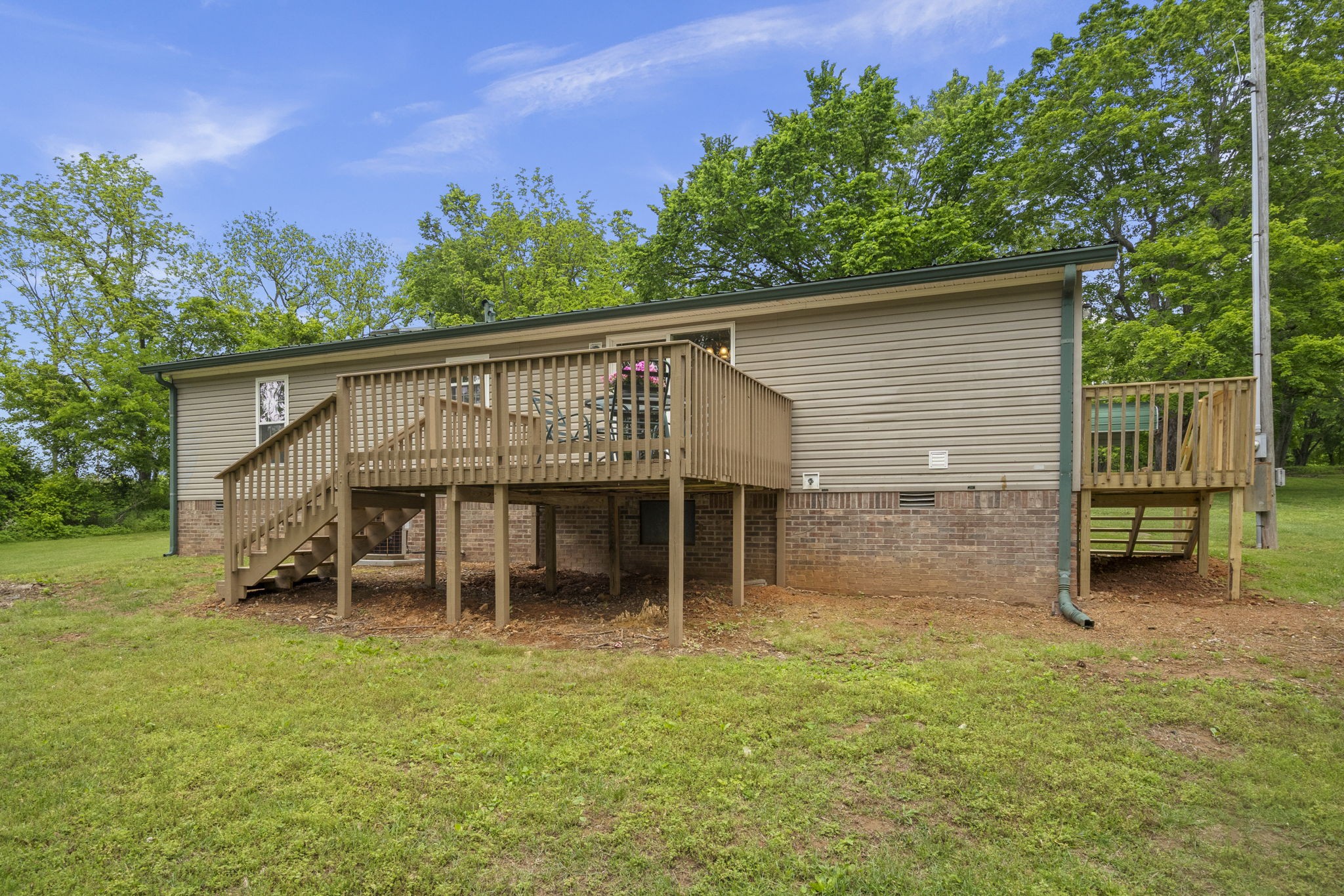 4012 Armstrong Road Springfield, TN 37172 - Photo 34 of 39 a backyard of a house with yard barbeque oven and outdoor seating