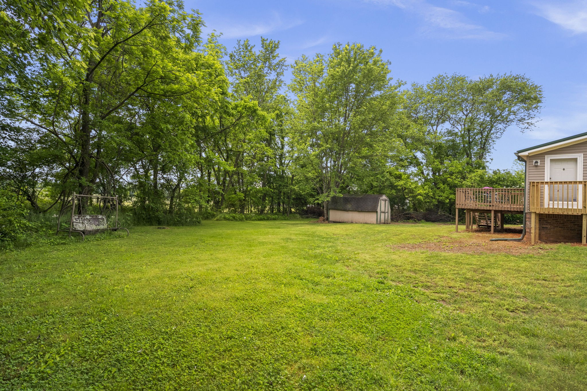 4012 Armstrong Road Springfield, TN 37172 - Photo 35 of 39 a backyard of a house with lots of green space