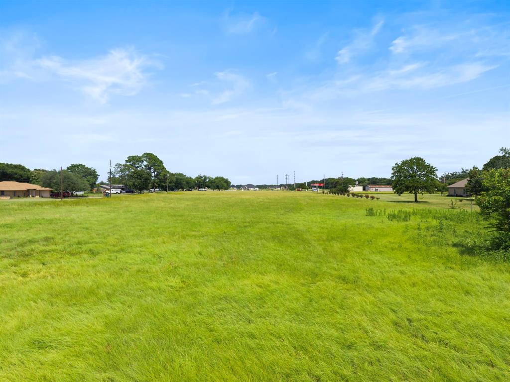 117 Brumley Road Krugerville, TX 76227 - Photo 19 of 20 a view of a lake with houses in the back