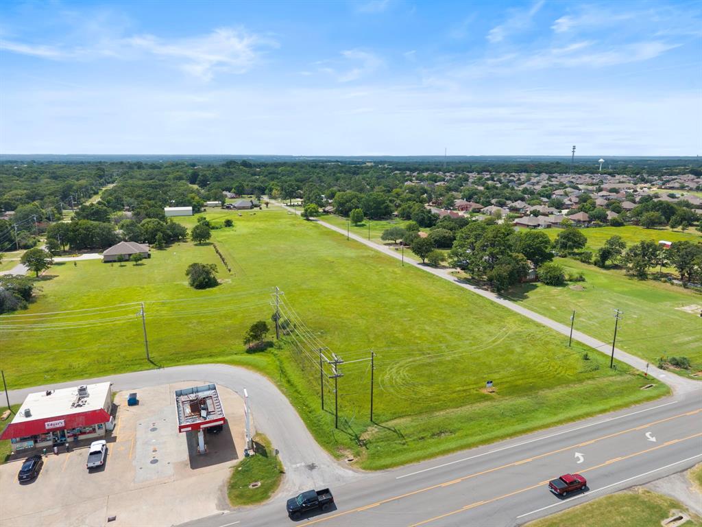 117 Brumley Road Krugerville, TX 76227 - Photo 4 of 20 an aerial view of a tennis ground and a houses