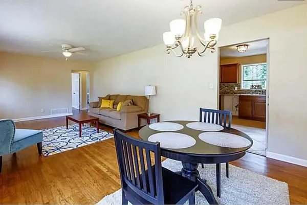 a view of a dining room with furniture
